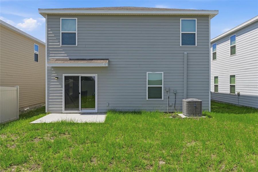 Exterior details and patio area of a home in Avalon Woods, Newberry (Image 29).