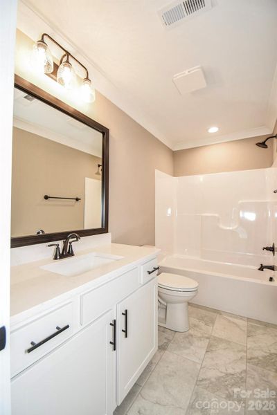 Furnished interior view inside a new home in , Wingate (Image 14).