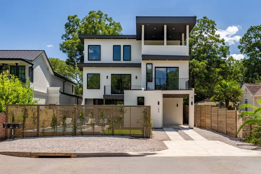 Bold geometric lines and crisp stucco define this multi-level contemporary home. Bold geometric lines and crisp stucco define this multi-level contemporary home.