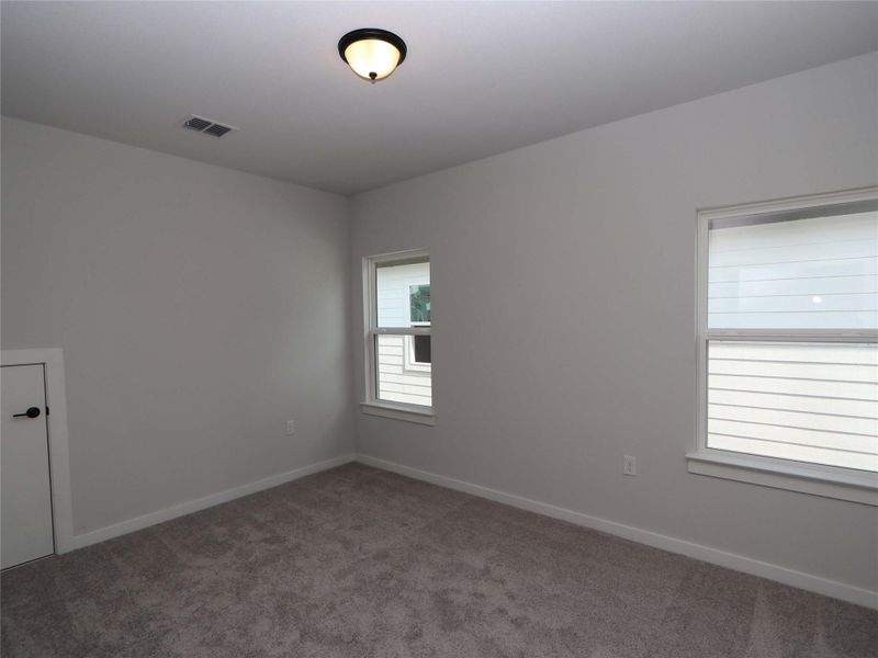 Spacious, unfurnished interior of a new home in Estancia West, Manchaca (Image 20).