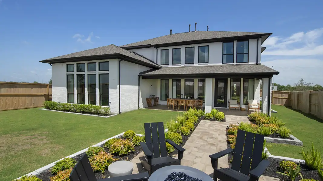 Exterior details and patio area of a home in Meridiana, Manvel (Image 3).