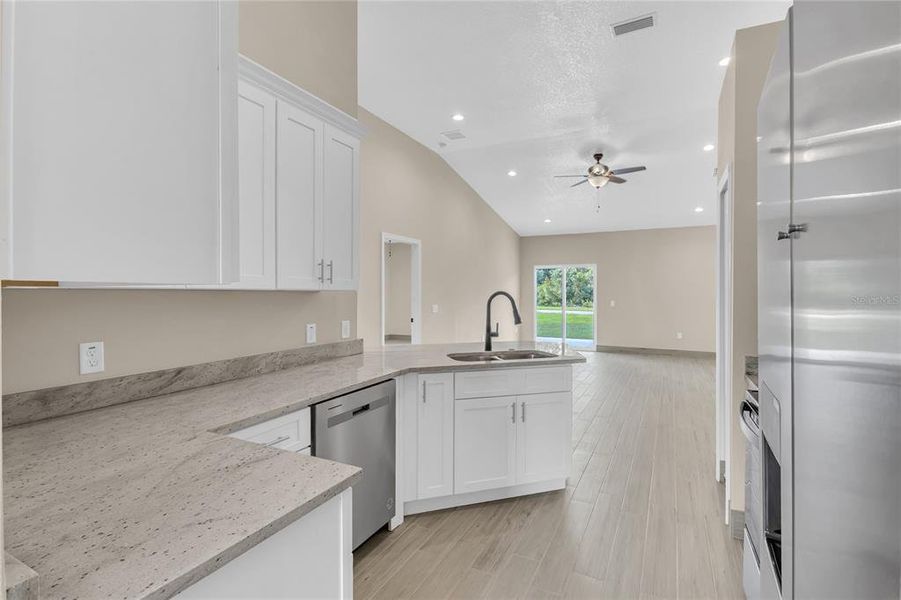 Furnished interior view inside a new home in , Kissimmee (Image 10).
