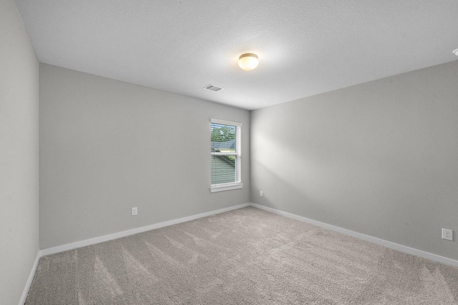 Spacious, unfurnished interior of a new home in Barton Creek Ranch, Conroe (Image 26). Spacious, unfurnished interior of a new home in Barton Creek Ranch, Conroe (Image 26).