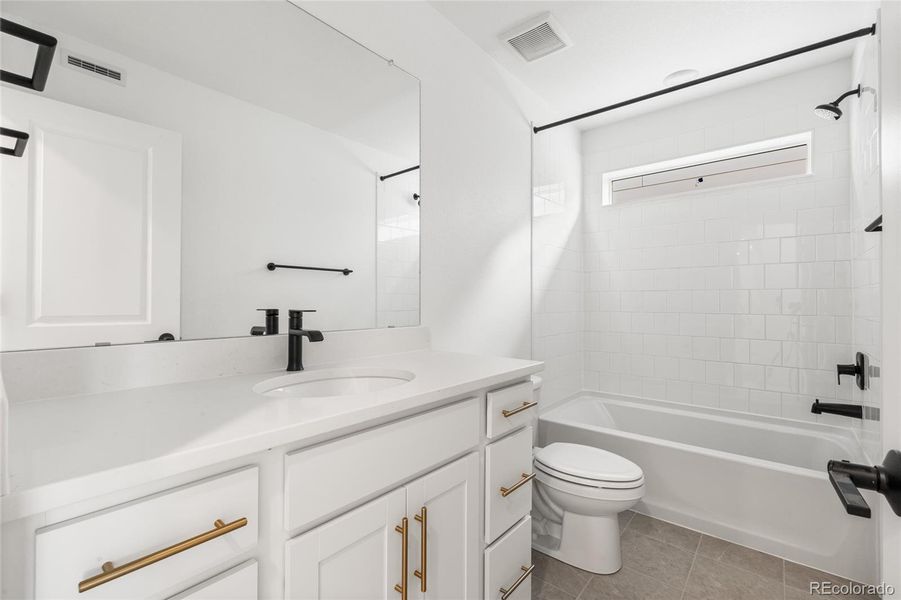 Furnished interior view inside a new home in Harvest Crossing, Aurora (Image 8).