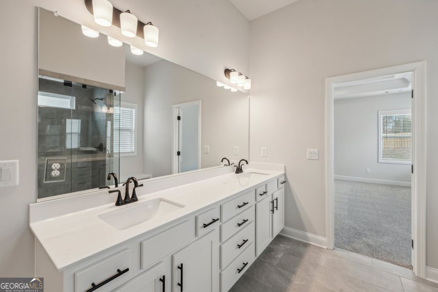 Furnished interior view inside a new home in Ponderosa Farms Manor, Gainesville (Image 56). Furnished interior view inside a new home in Ponderosa Farms Manor, Gainesville (Image 56).