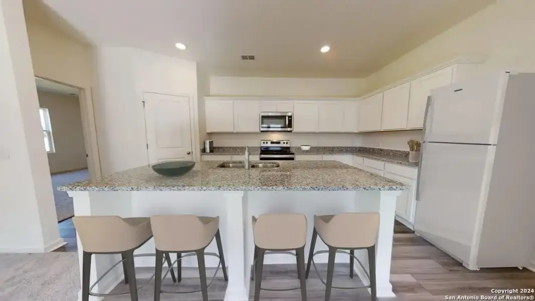 Furnished interior view inside a new home in Hennersby Hollow, San Antonio (Image 3).