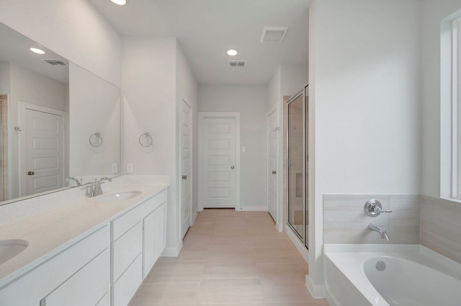 Furnished interior view inside a new home in Mason Woods, Cypress (Image 12).