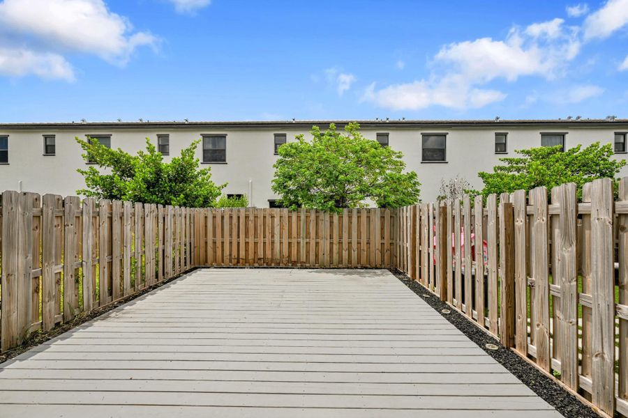 Front exterior of a new home in , Homestead, FL, highlighting curb appeal (Image 24). Front exterior of a new home in , Homestead, FL, highlighting curb appeal (Image 24).