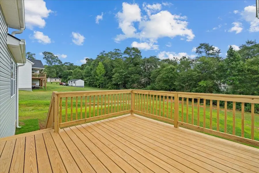 Exterior details and patio area of a home in Fall Creek, Inman (Image 3).