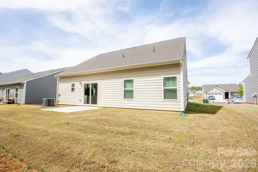 Exterior details and patio area of a home in Colonial Crossing, Troutman (Image 4).