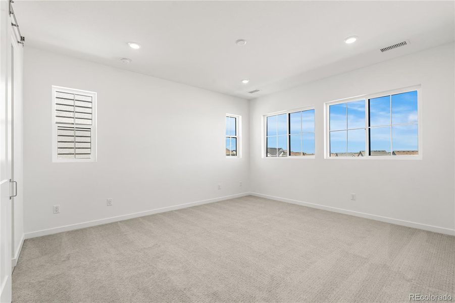 Spacious, unfurnished interior of a new home in Harmony at Solstice, Littleton (Image 32).