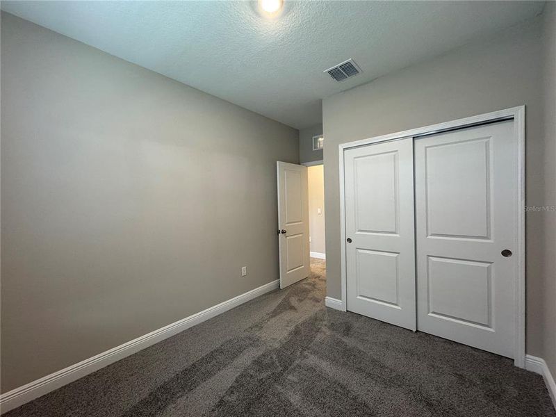 Spacious, unfurnished interior of a new home in Hamlin Ridge, Winter Garden (Image 25).