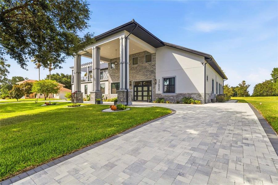 Exterior details and patio area of a home in , Groveland (Image 3).