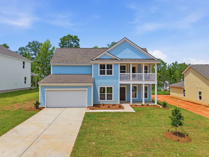 Front exterior of a new home in Carriage Estates, Lexington, SC, highlighting curb appeal (Image 27). Front exterior of a new home in Carriage Estates, Lexington, SC, highlighting curb appeal (Image 27).