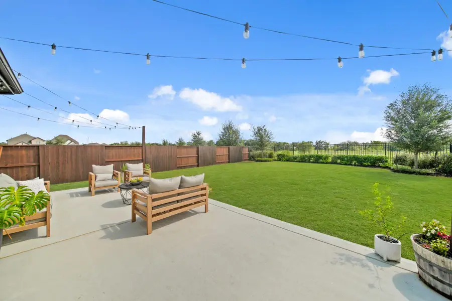 Front exterior of a new home in , Rosharon, TX, highlighting curb appeal (Image 2).