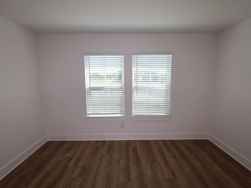 Spacious, unfurnished interior of a new home in Hallimore Ranch, Rosenberg (Image 24).
