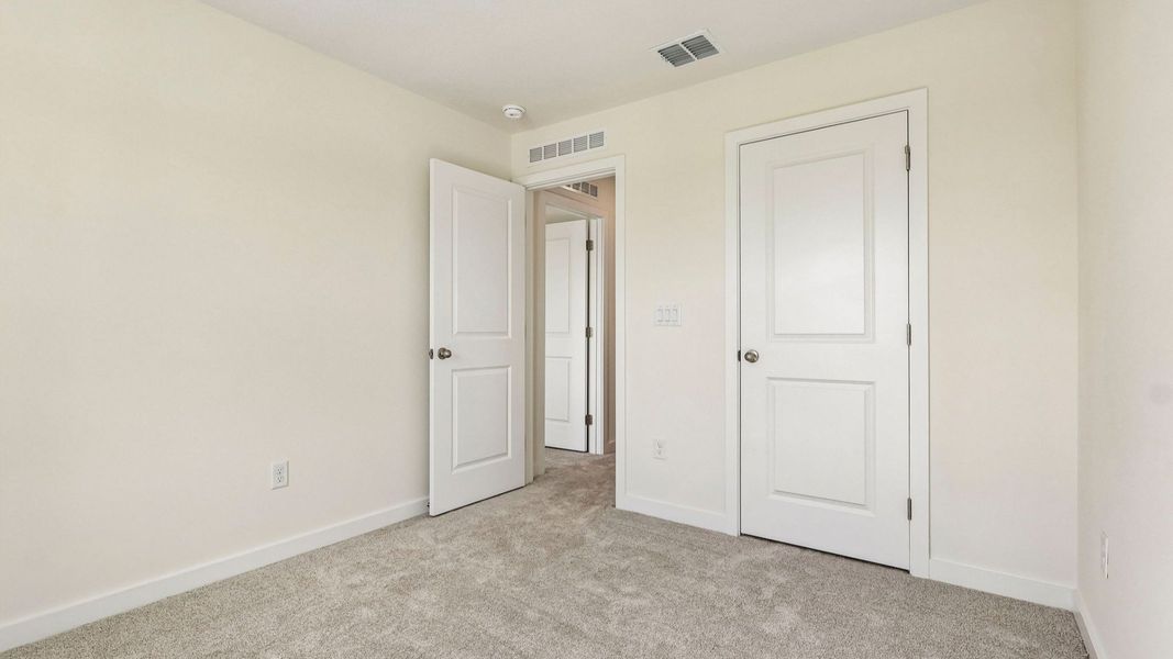 Furnished interior view inside a new home in Cyrene at Harmony, St. Cloud (Image 32).