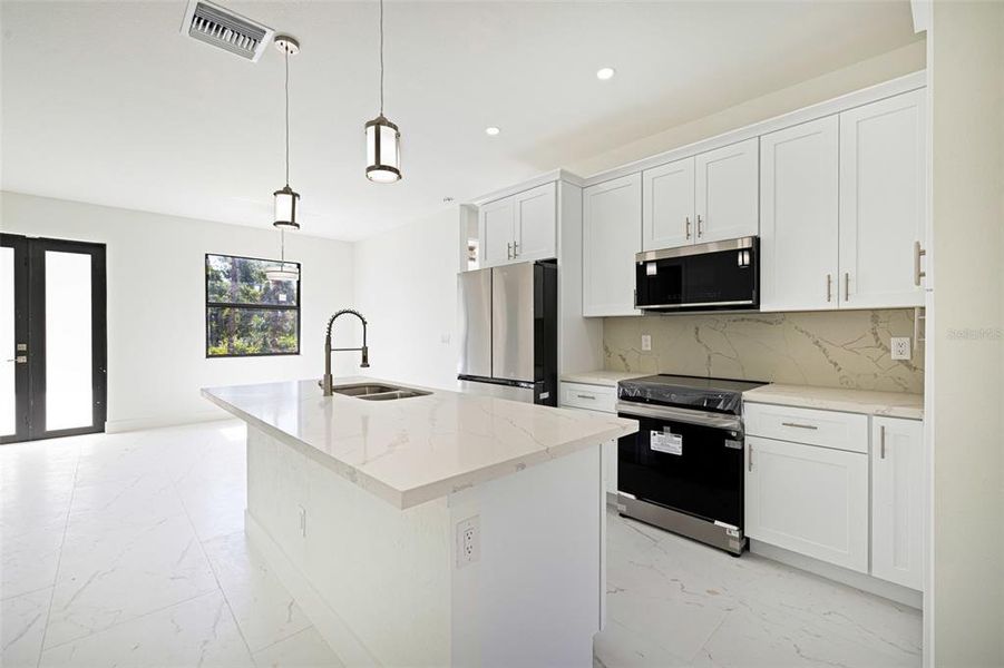 Furnished interior view inside a new home in , Port Charlotte (Image 10).