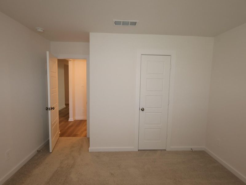 Spacious, unfurnished interior of a new home in Pinewood at Grand Texas, New Caney (Image 23).