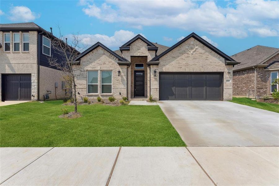 Front exterior of a new home in , Celina, TX, highlighting curb appeal (Image 2).