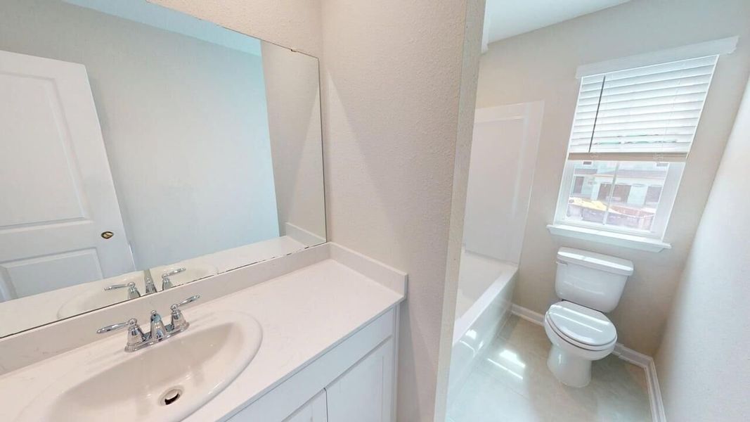 Furnished interior view inside a new home in RiverTown, St. Johns (Image 6).