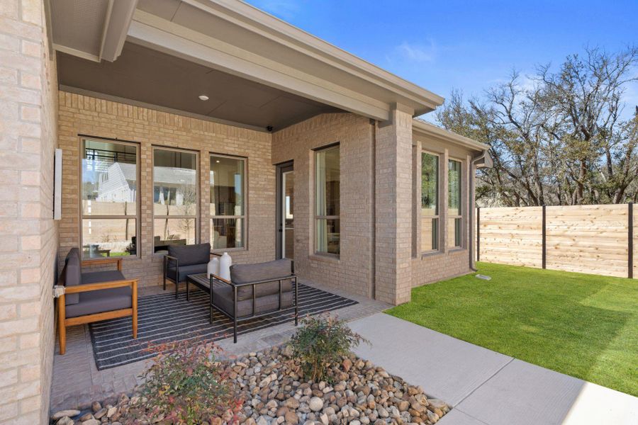 Exterior details and patio area of a home in Highland Village, Georgetown (Image 3).