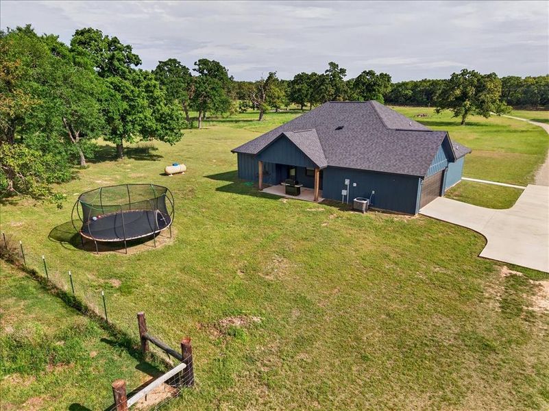 Front exterior of a new home in , Athens, TX, highlighting curb appeal (Image 23).