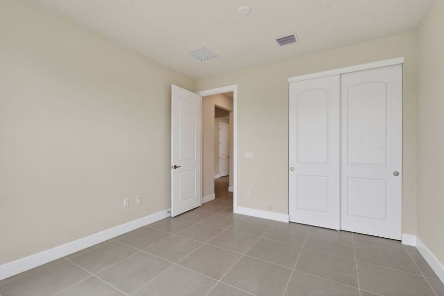 Spacious, unfurnished interior of a new home in Del Webb Tradition, Port St. Lucie (Image 58).