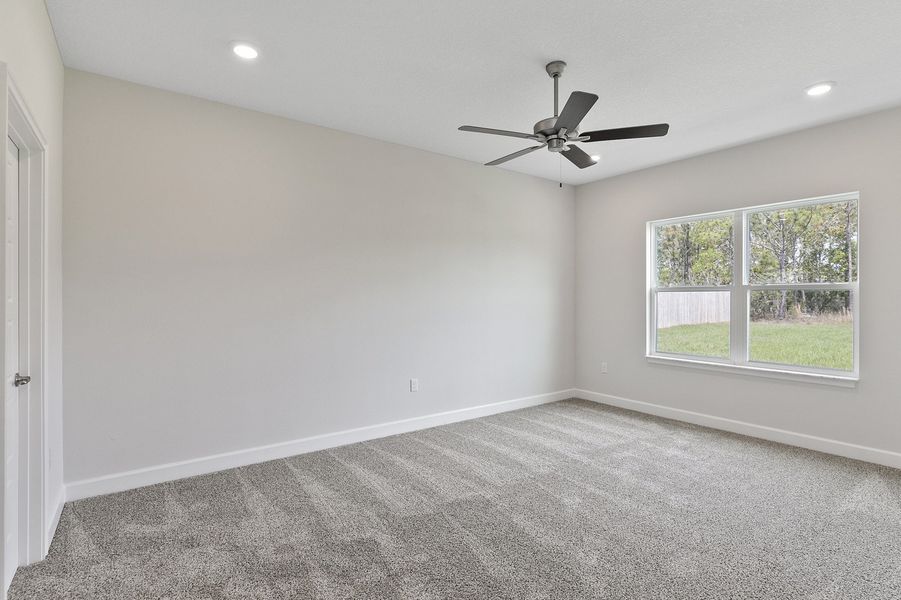 Representative unfurnished interior of a home built from the 2705 by Adams Homes in Winding Oaks, Weeki Wachee (Image 27).