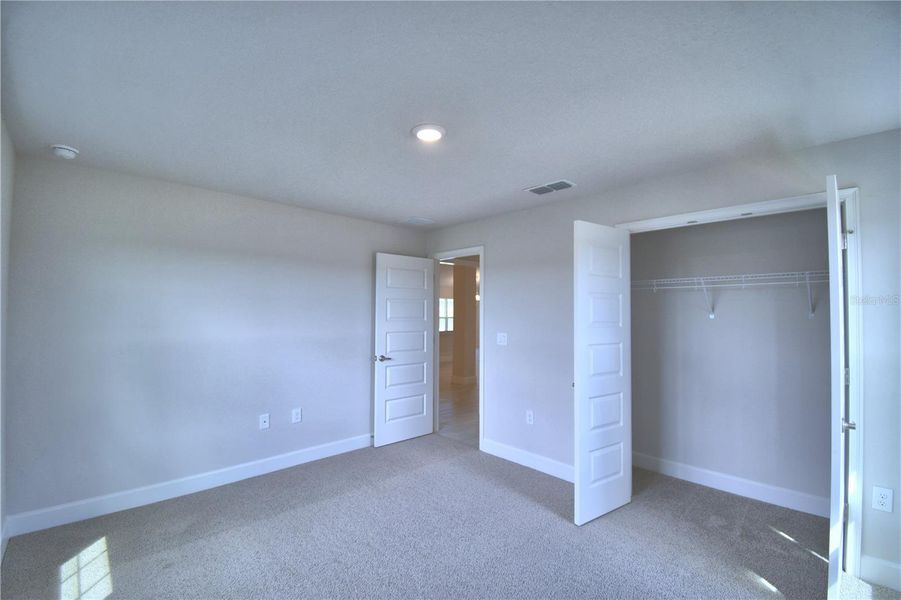 Spacious, unfurnished interior of a new home in Lake Juliana Estates, Auburndale (Image 24).