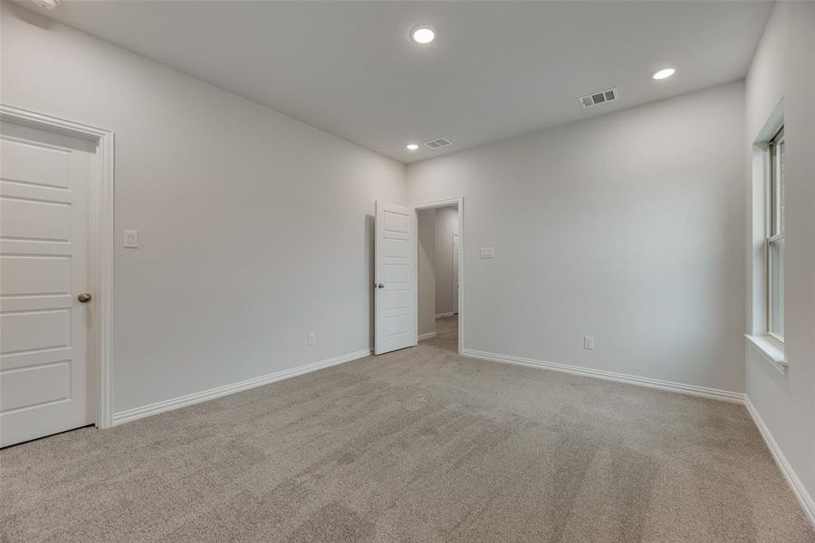 Spacious, unfurnished interior of a new home in Valencia On The Lake, Little Elm (Image 14).