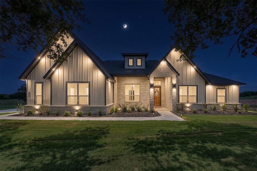 Front exterior of a new home in , Poolville, TX, highlighting curb appeal (Image 19).