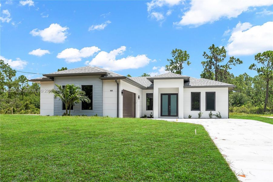 Front exterior of a new home in , Sebring, FL, highlighting curb appeal (Image 20). Front exterior of a new home in , Sebring, FL, highlighting curb appeal (Image 20).