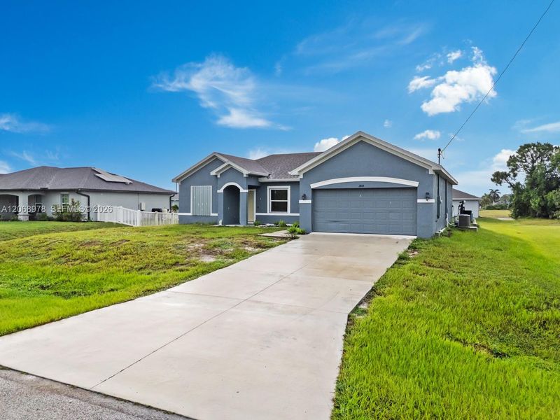 Front exterior of a new home in , Cape Coral, FL, highlighting curb appeal (Image 17).