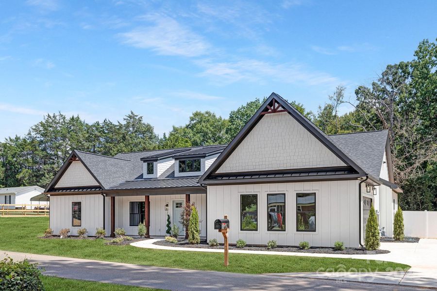 Front exterior of a new home in , Belmont, NC, highlighting curb appeal (Image 2). Front exterior of a new home in , Belmont, NC, highlighting curb appeal (Image 2).