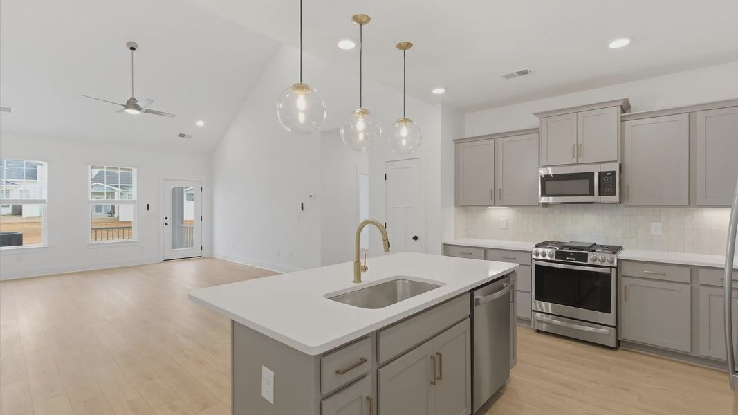 Furnished interior view inside a new home in Village at Midway, Anderson (Image 13).