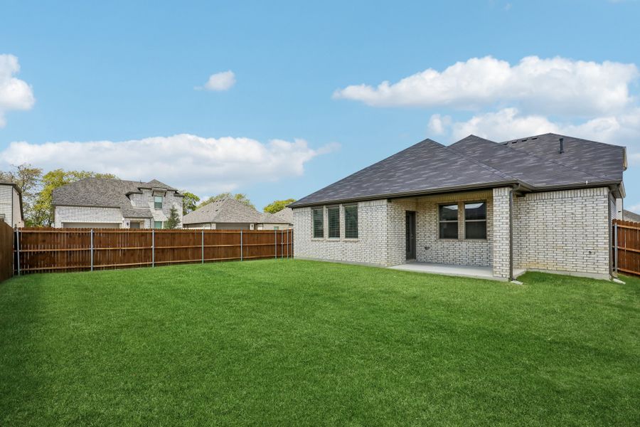 Covered Patio in the Holden home plan by Trophy Signature Homes