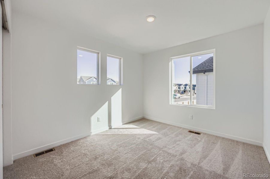 Spacious, unfurnished interior of a new home in Copper Chase: The Celestial Collection, Colorado Springs (Image 9).