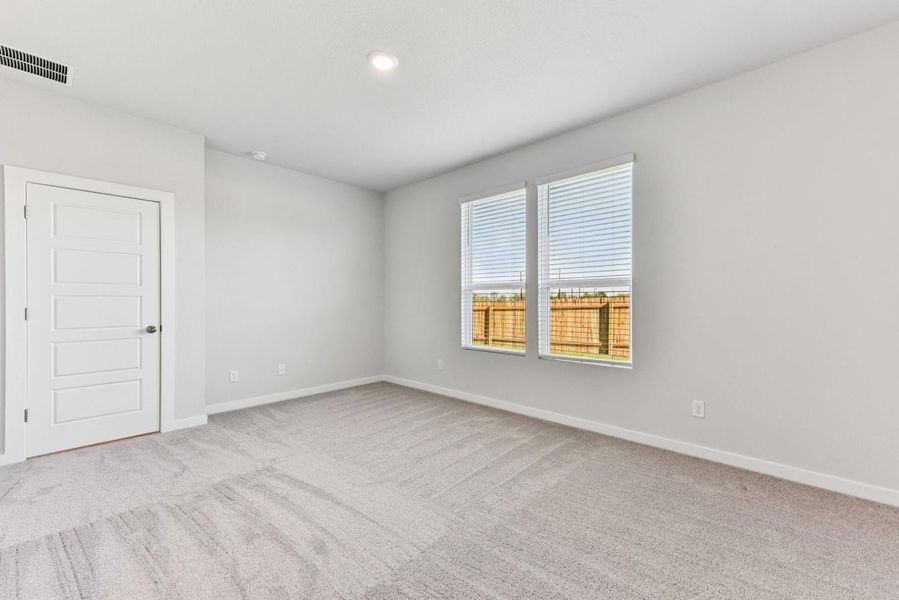 Spacious, unfurnished interior of a new home in The Glen at Stallion Run, Buda (Image 19).