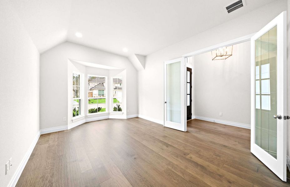 Representative unfurnished interior of a home built from the 2406 by Ravenna Homes in The Highlands 55′, Porter (Image 21).