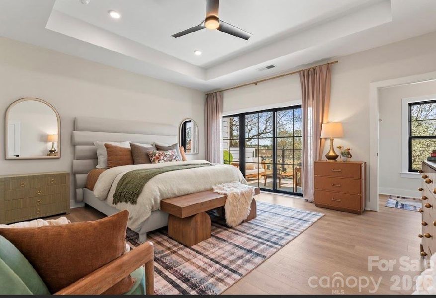 Primary Bedroom leads to private balcony.