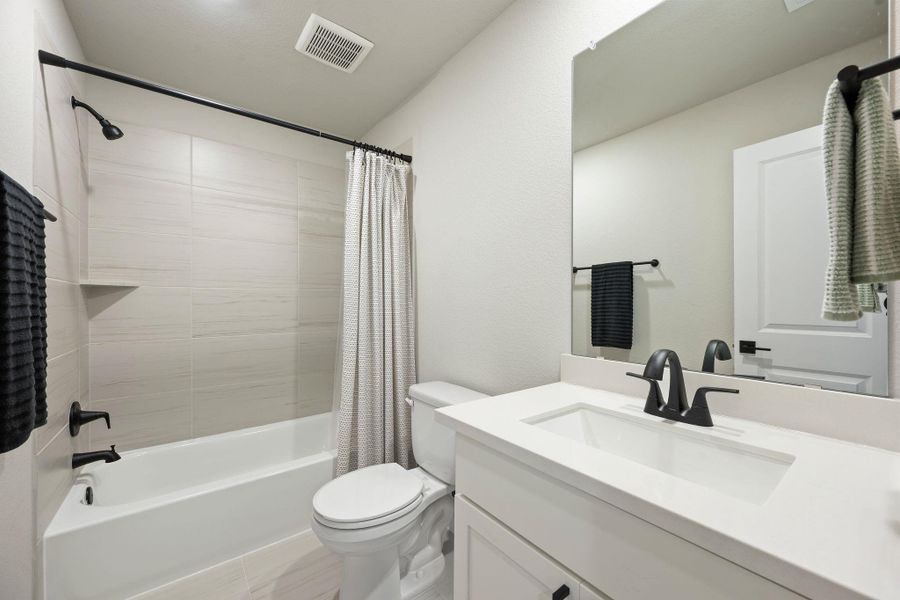 Clean lines and modern tile work define this contemporary full bath. Clean lines and modern tile work define this contemporary full bath.