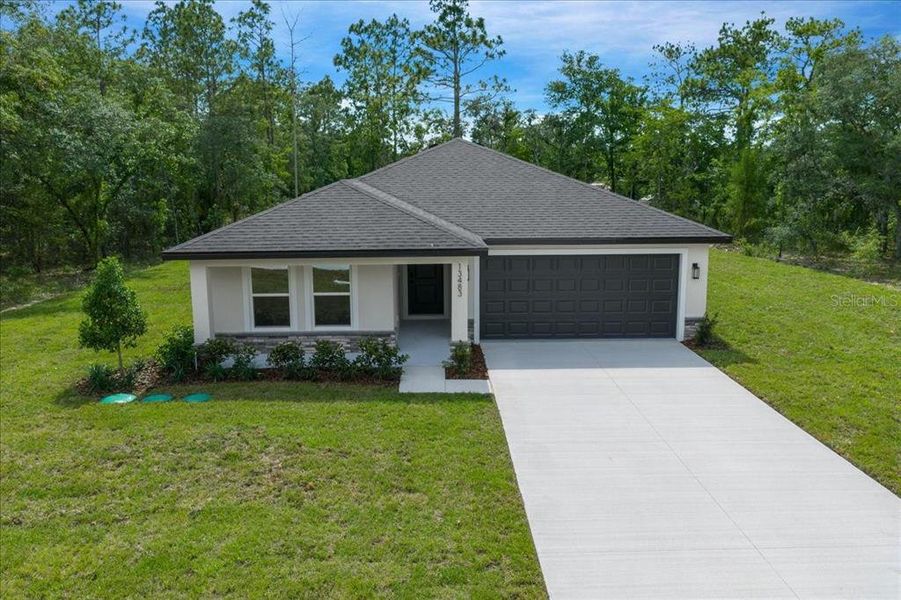 Front exterior of a new home in , Brooksville, FL, highlighting curb appeal (Image 2). Front exterior of a new home in , Brooksville, FL, highlighting curb appeal (Image 2).