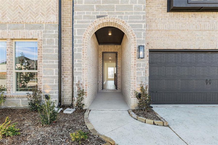Exterior details and patio area of a home in Creekview Meadows, Pilot Point (Image 4).
