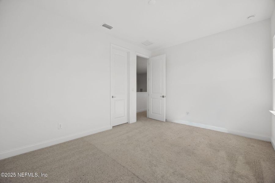 Spacious, unfurnished interior of a new home in Amelia National, Fernandina Beach (Image 22).