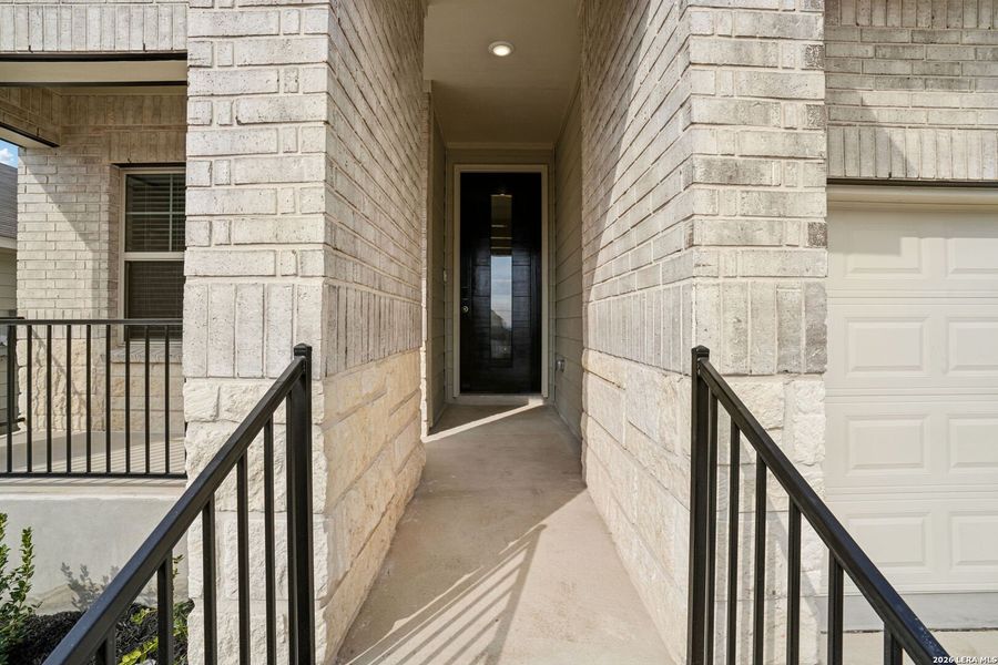 Exterior details and patio area of a home in Lark Canyon, New Braunfels (Image 4).