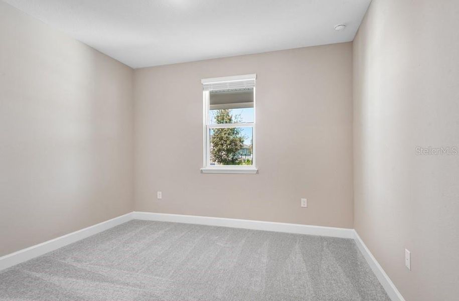 Spacious, unfurnished interior of a new home in Colbert Landings, Palm Coast (Image 14).