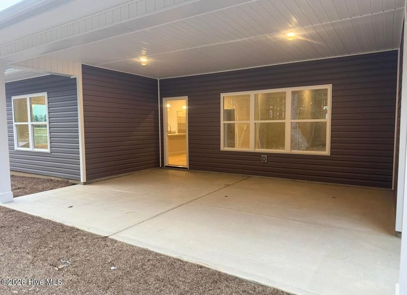 Exterior details and patio area of a home in Summer Place, Grimesland (Image 18).