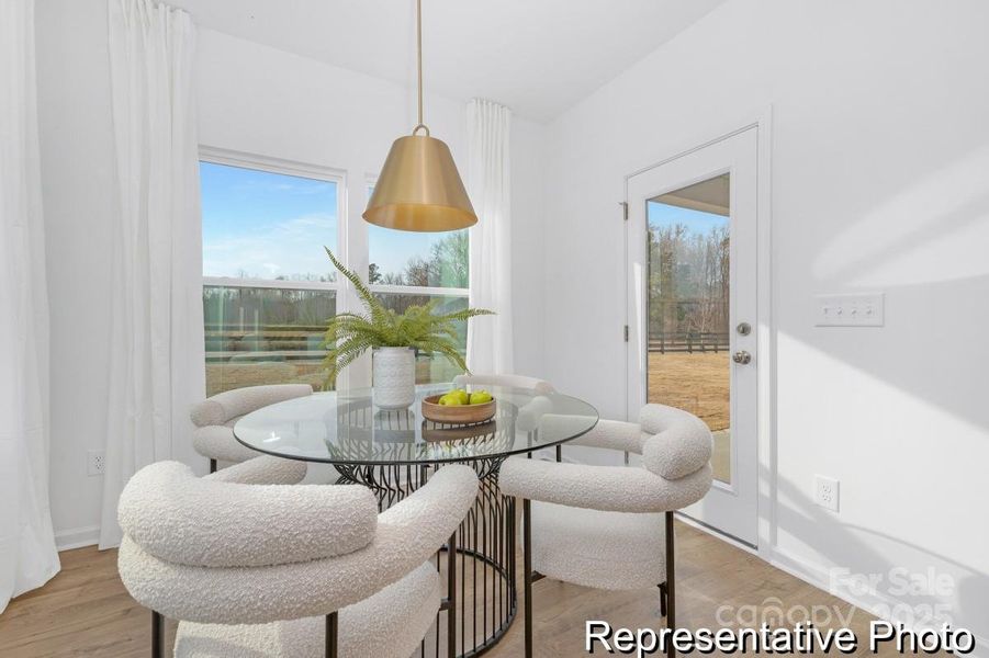 Furnished interior view inside a new home in Whispering Hills, Locust (Image 6).