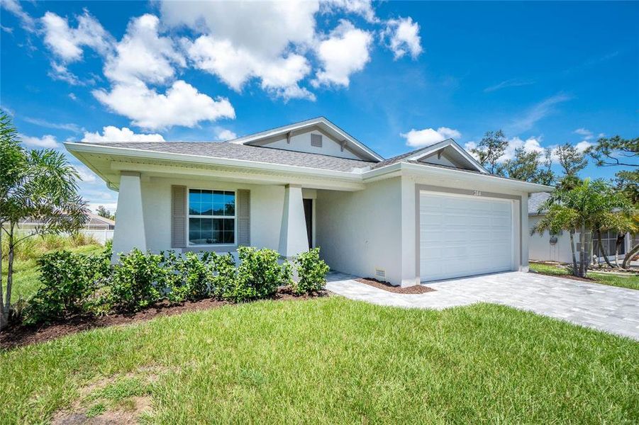 Front exterior of a new home in , Rotonda West, FL, highlighting curb appeal (Image 27). Front exterior of a new home in , Rotonda West, FL, highlighting curb appeal (Image 27).